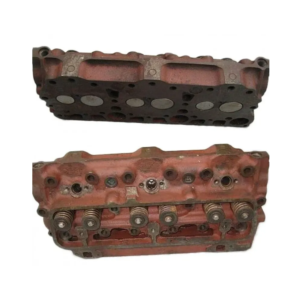 Головка блоку без клапанів з напрямними втулками