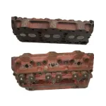 Головка блоку без клапанів з напрямними втулками